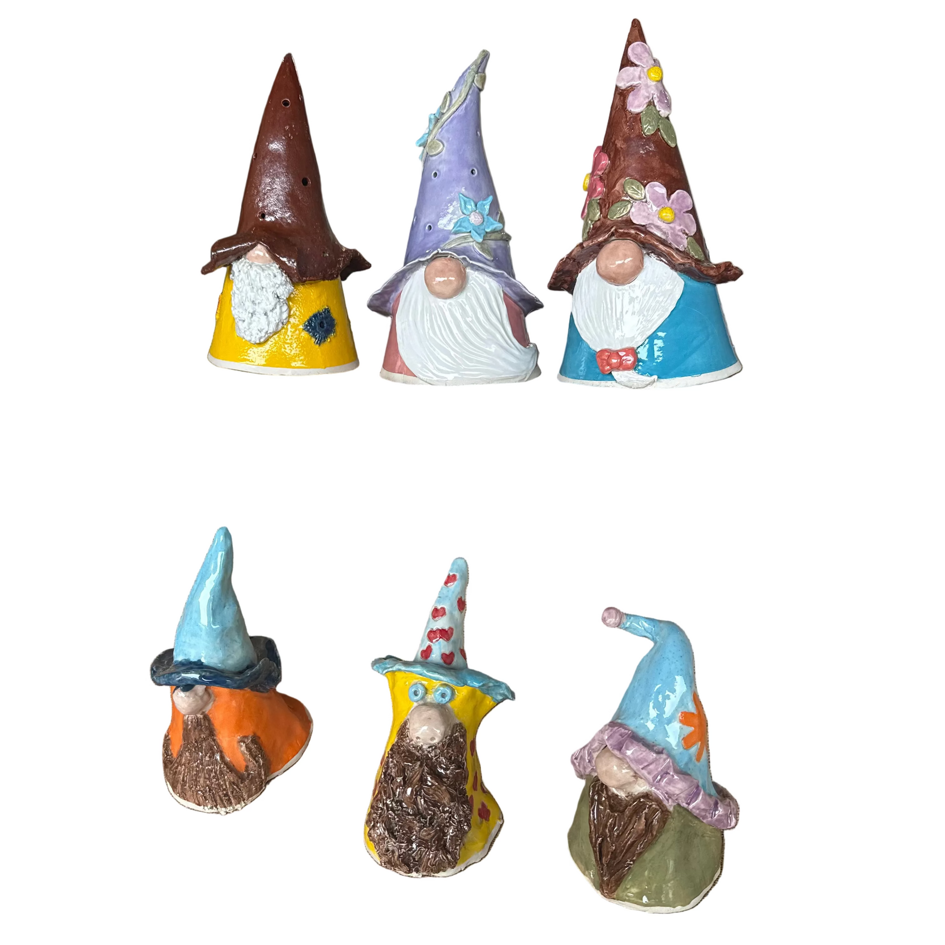 Set of small gnome figurines with a white background.

