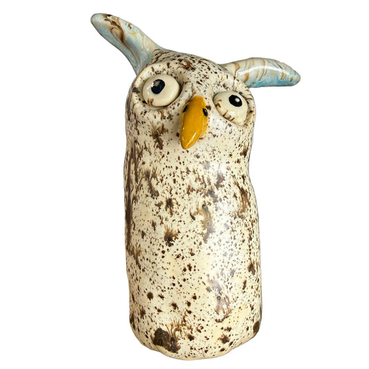 Decorative owl figurine with a white  background
