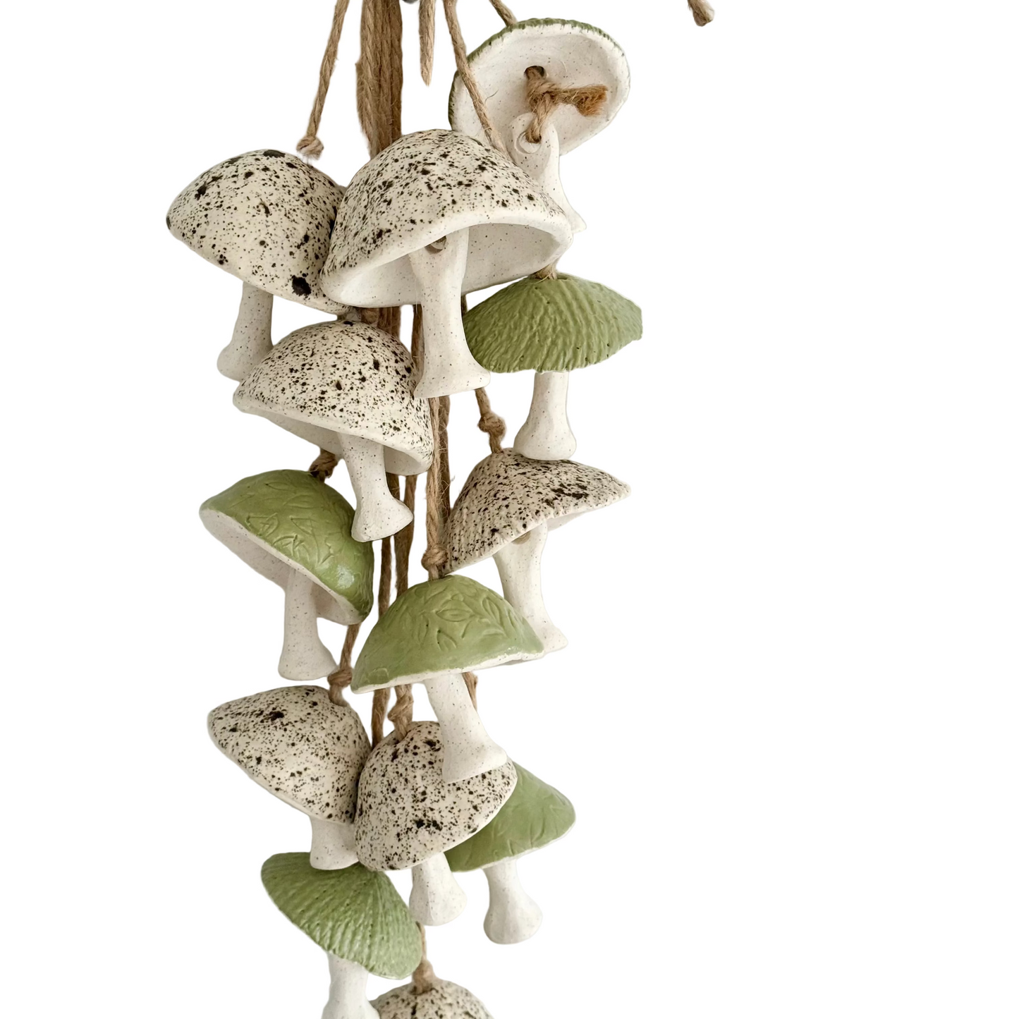 Decorative wall hanging with mushrooms on a white background
